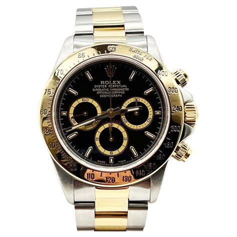 rolex daytona stahl gold schwarzes zifferblatt